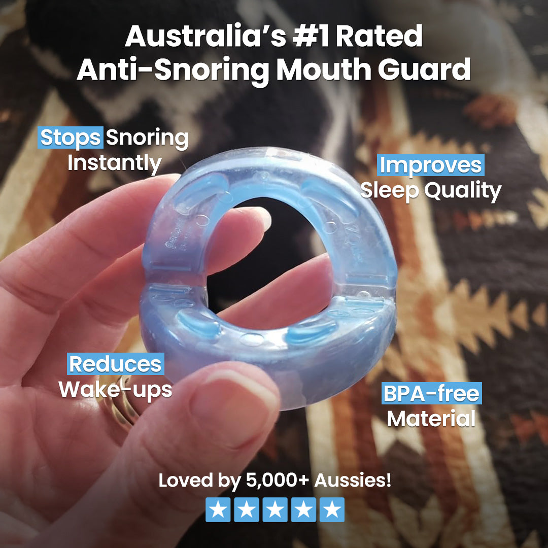 DreamSnug anti-snoring mouth guard Australia — blue dental device held in hand for effective snoring relief